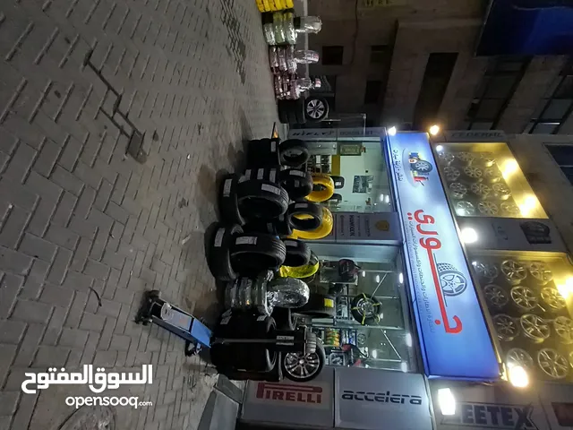 محل اطارات و جنطات وزينه سيارات وفك وتركيب وتصليح اطارات وبناشر للبيع او ممول متفرغ
