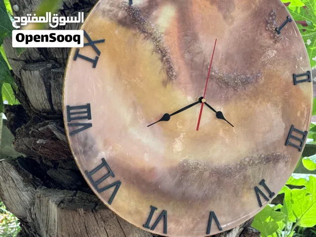 ساعه حائط و لوحه غطاء للعداد الكهرباء صنع يدوي بالريزون