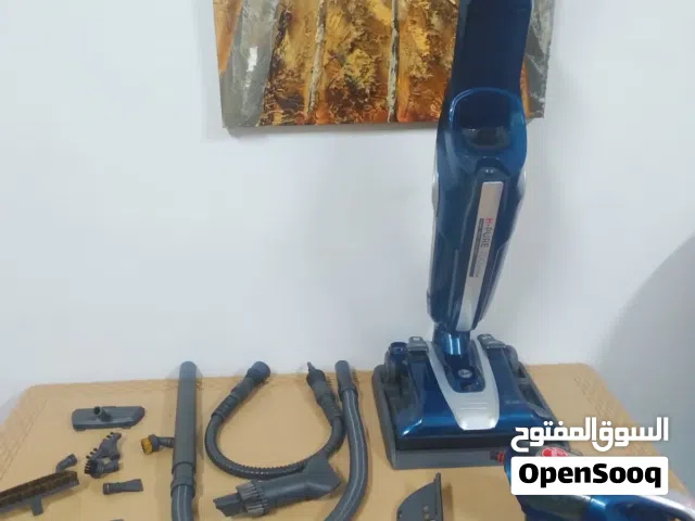 مكنسة ماركة هوفر تعمل بنظام مكنسة سحب فاكيوم عادي بمخرجين و نظام بخار للتنظيف و التعقيم مع