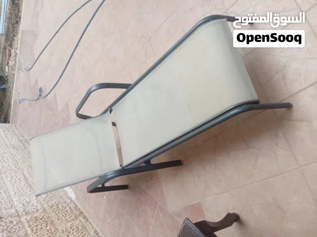 كرسي مسبح للتشميس