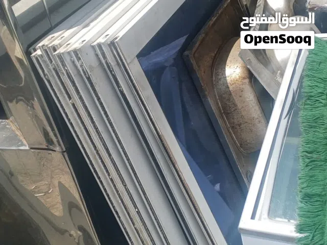 نشتري جميع انواع شبابيك ابواب المنيوم وابواب خشب