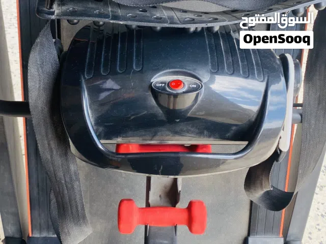 سير كهربائي ومعاه حزام لحرق دهون