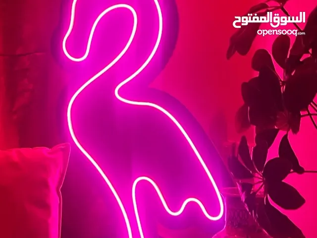 اثنين ستاندات نيون لون وردي على شكل فلامينجو