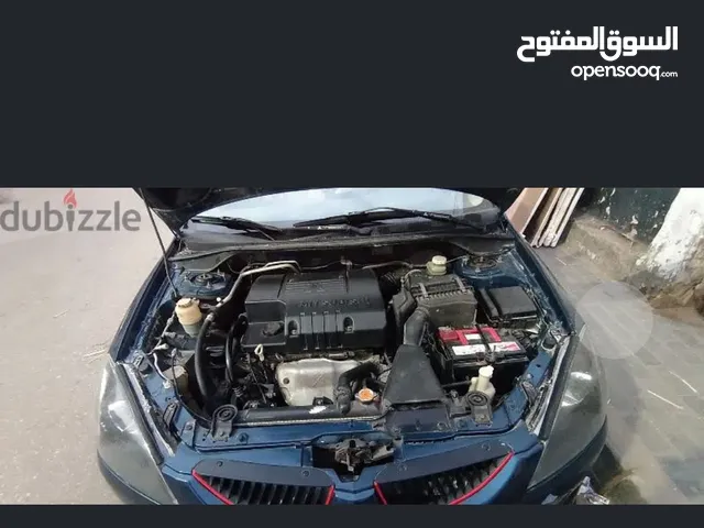 لانسر بومه 1600ccاتوماتك 2004 كامله بدون فتحة سقف وايرباج فقط