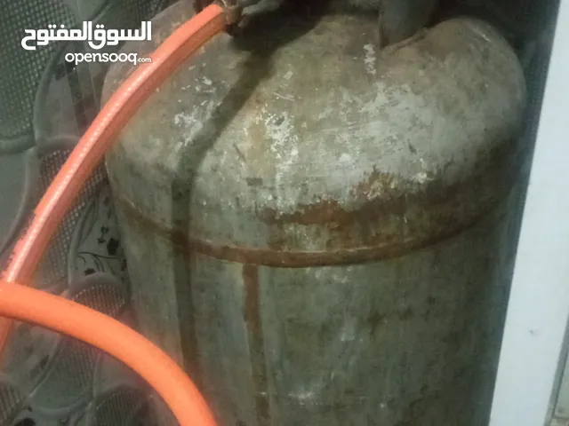 اسطوانه غاز مع شولة ودولاب وادوات مطبخ متكاملة