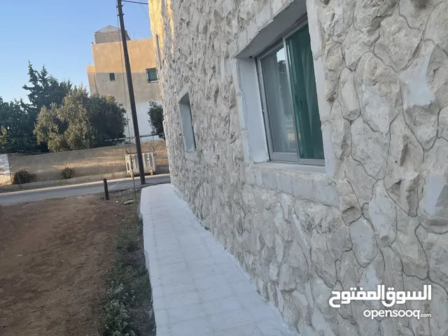 ارض دونم مع بيت ارضي وبيت طابقين