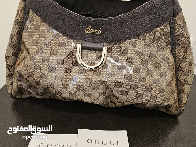 GUCCI handbag ..never used .. unwanted gift ..genuine with papers