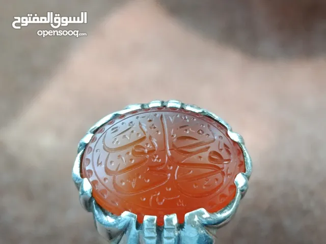 عقيق يماني برتقالي منقوش عليه (نور على نور) قياس 22