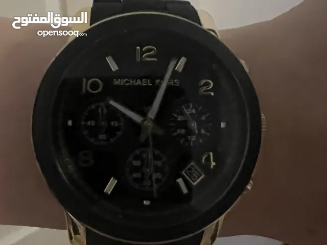 Micheal kors black and gold watch