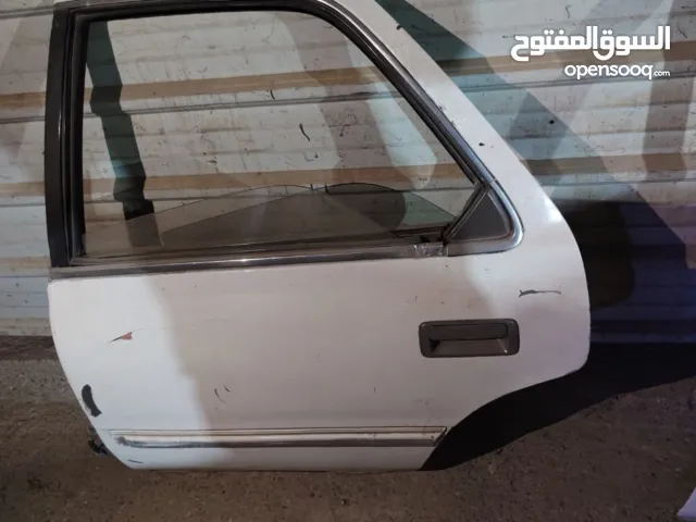 باب كرسته كصيف واحد فقط كامل ابطانه ماطور قفل كلشي كامل باب نظيف  الباب الخلفي وره السايق