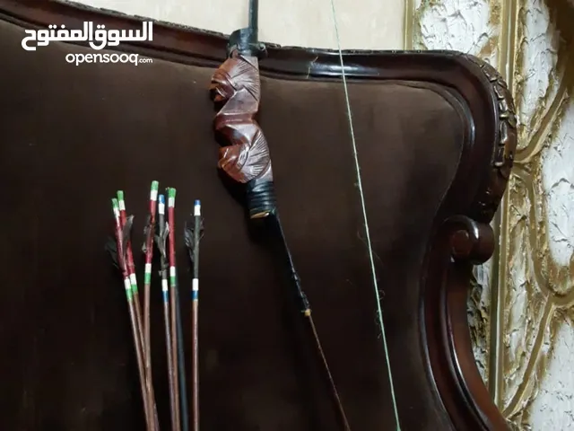 قوس وسهام خشبية انتيك