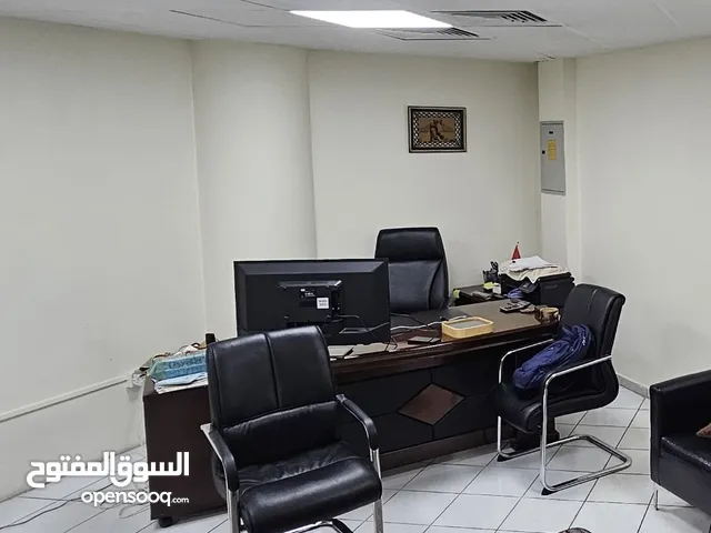 Office tables and bookshelf