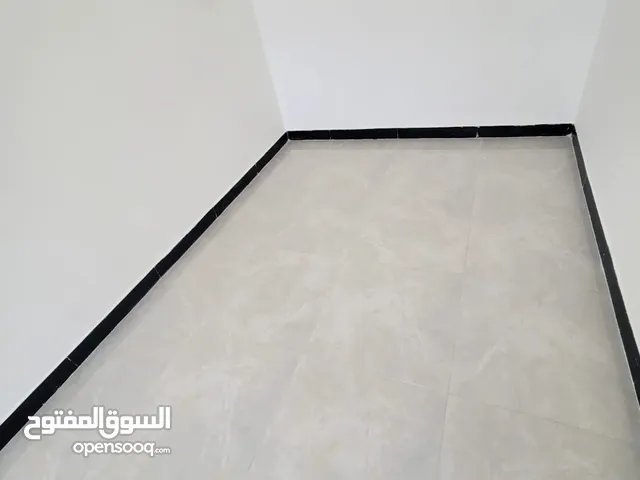 بنايه تجاريه للبيع في اسكان المنصور شارع مستشفى الطفل