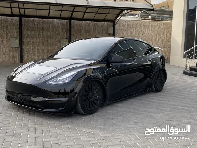 Tesla model Y dual motor 2023- تيسلا مودل واي ديل موتر بتعديلات مميزة جدا من بلادها