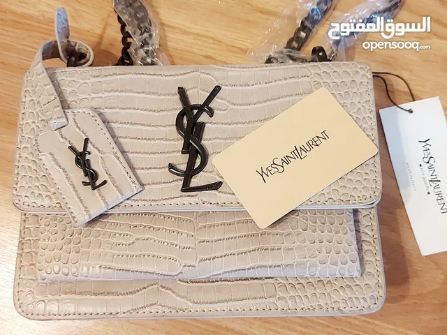شنتة ستاتي جديدة صناعة فرنسا ماركة Yves Saint Laurent جلد اوف وايت مع الشهادة