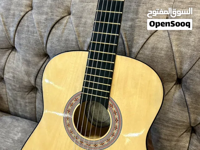 Electric Guitar جيتار مطور ماركة دراقون فلاي كهربائي ويعمل كجيتار عادي . مستعمل مع الكرتون