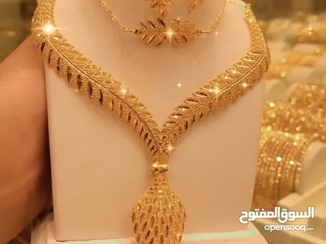 ذهب صافي عيار 21 طقم قصن زيتون
