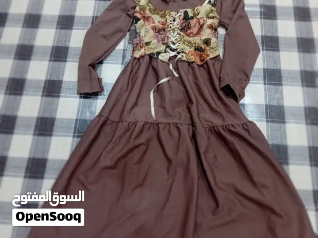 فستان نسائي لون بني