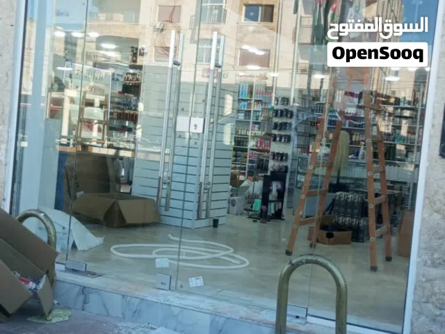واجهات سيكوريت زجاج محلات أبواب سيكوريت.. "جاهزون للتركيب الفوري والصيانة الطارئة لواجهات المحلات "