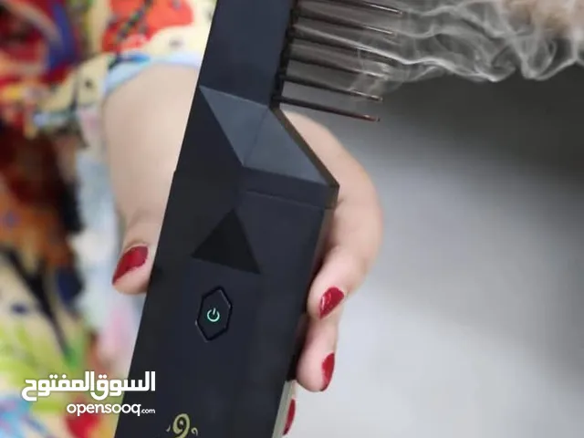 مبخرة الشعر المطورة - مبخرة الكترونية محمولة مع رأس مشط للشعر مبخرة إلكترونية تعمل بكل دقة وكفاء