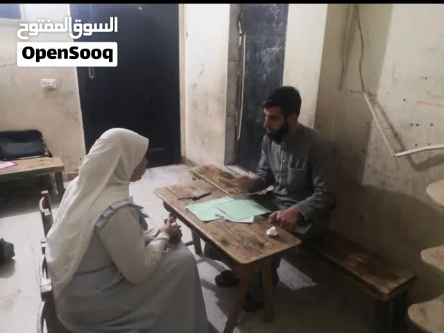 معلم للقران الكريم ومدرسا للتجويد