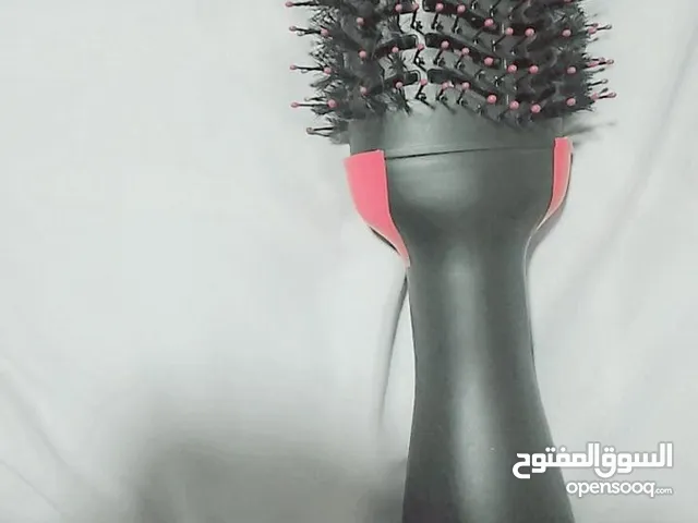 فرشاة تصفيف الشعر الكهربائية