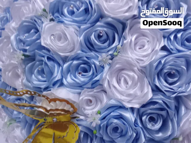 أرقى بوكيهات ورد الساتان تبدأ أسعارنا من 5د