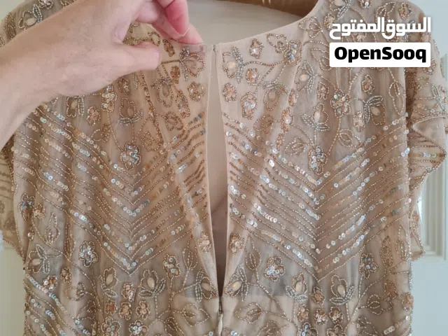 جديد* فستان سهره من مونسون . اصدار محدود مطرز يدويا بالترتر الذهبي . تم شراؤه ب 165 ريال من الشركة.