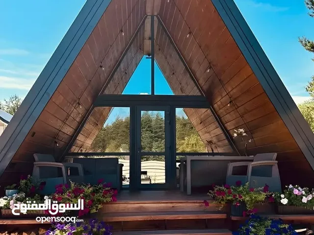 اكواخ خشبية  ومسابح جاهزة او  وبناء واللاندسكيب والمقاولات