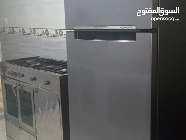 ثلاجة سامسونج 250 لتر الفريزر في الأعلى + فرن اينوكس غازي صنع محلي وبجودة