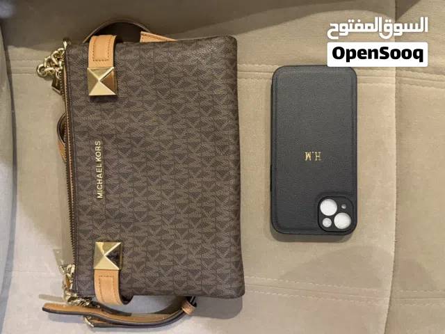 شنطة ماركة مايكل كورس بنقشة الماركة