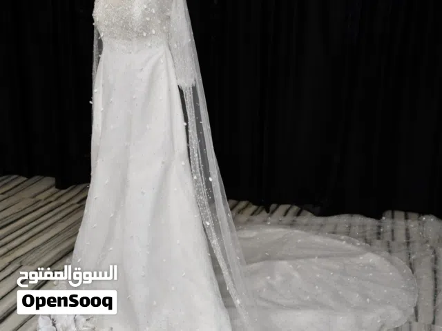 فرصة مميزة.. فستان عرس راقٍ كالجديد