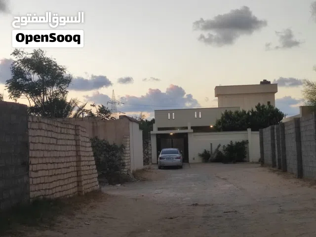 400 متر للبيع تاجوراء ارض الوز سيدي خليفة مقسم عامر بسكان قريب من المعبد مكام حيوي وممتاز