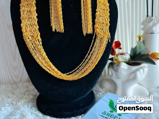 *إطلالة خليجية تفيض فخامة وأناقة* شال مع الأقراط مطلي عيار 21 بتصميم خليجي راقي يخطف الأنظار