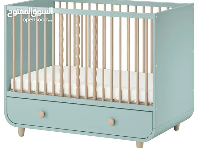 IKEA MYLLRA Cot with drawer, light turquoise