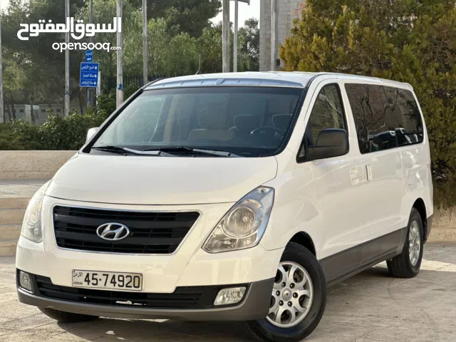 باص هونداي جراند H1 موديل 2015 وفل اتوماتيك شاشه وكاميرا وجنط 9 ركاب بنزين