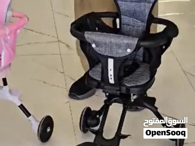 عربة أطفال  وبيها مجال