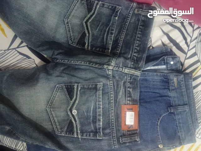 بنطلون جينز جديد مقاس 36