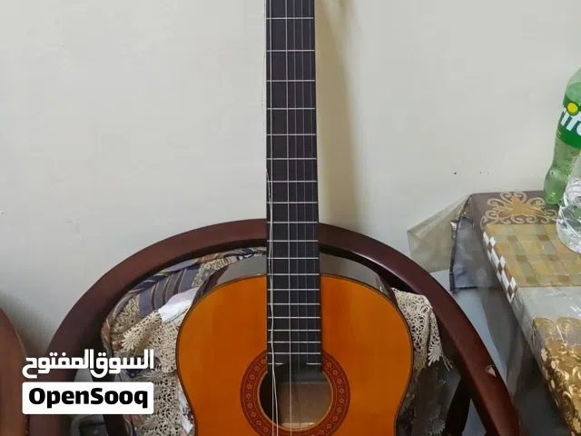 Yamaha c-70 guitar basically brand new Used once,2 strings broken(now removed) bag and pick included