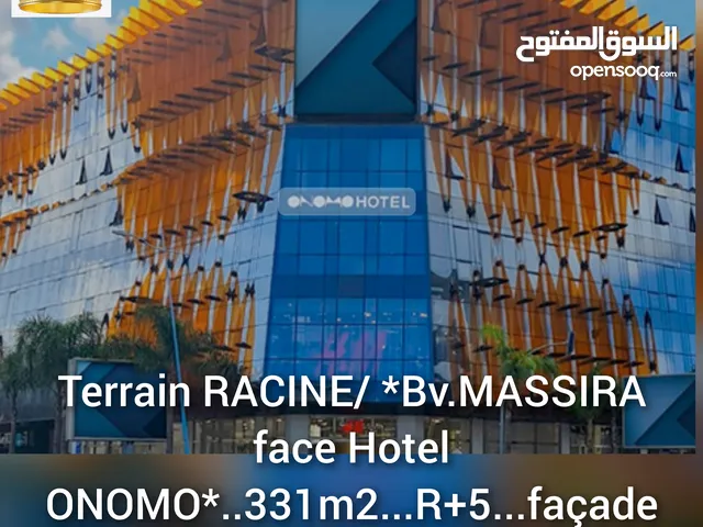 Terrain RACINE/ *Bv.MASSIRA face Hotel ONOMO*..331m2..