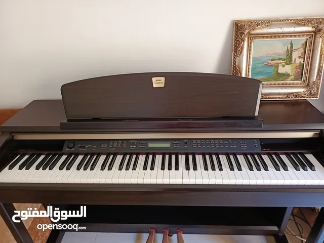 piano Yamaha clavinova CLP-150 وكالة بحالة الجديد