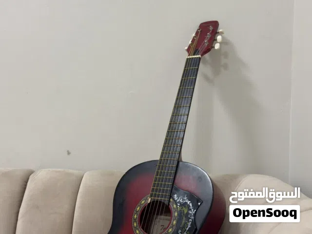 جيتار كلاسيك باللون الاحمر