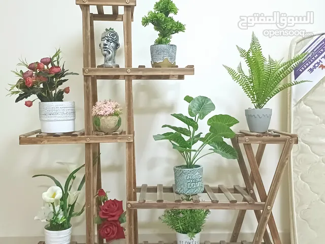 Plant stand with artificial plants
