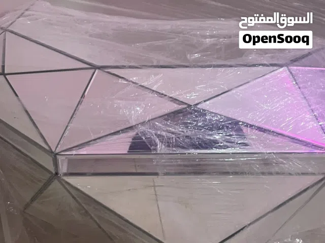 طاولة زجاجيه على شكل الماس دايموند
