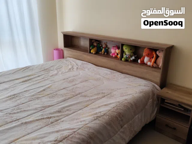 King Size bed with 2 night stands and dresser