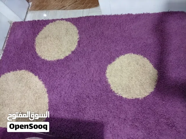 سجادة وسط صوف طويل