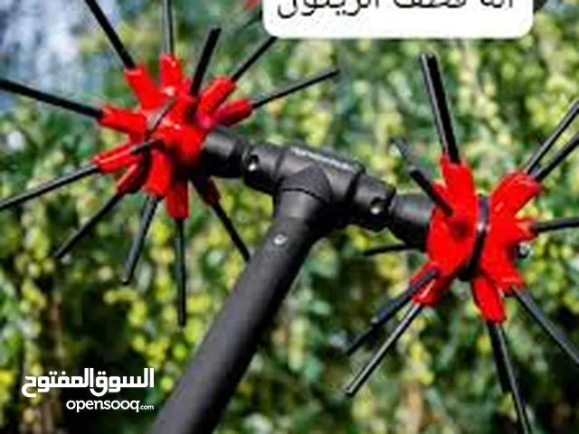 الة قطف الزيتون