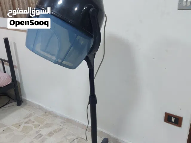 جهاز لتنشيف الشعر عند الصبغة أو للبدل بيسي