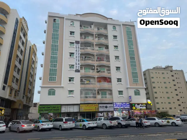 لليع بناية بالنعيمية مساحه 13500قدم  بدخل 12 بالمئه