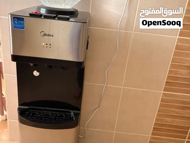 Water dispenser with storage